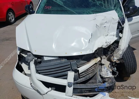 2007 Dodge Grand Caravan Sxt из США, поврежденный, VIN 2D4GP44L97R216373